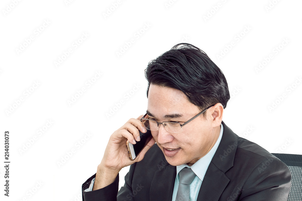 Young businessman talking with smart phone.He looking smiling .Copy space. Young businessman talking with smart phone.He looking smiling .Copy space.