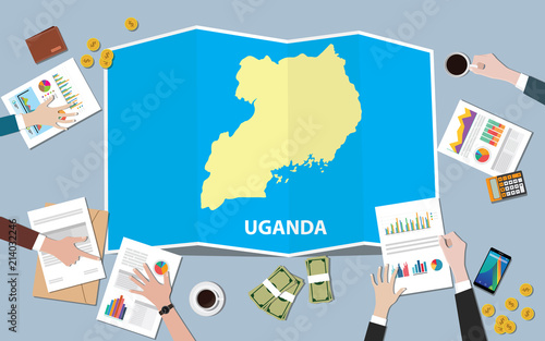 uganda africa economy country growth nation team discuss with fold maps view from top