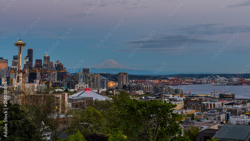 Seattle skyline at dusk with Mount Rainier