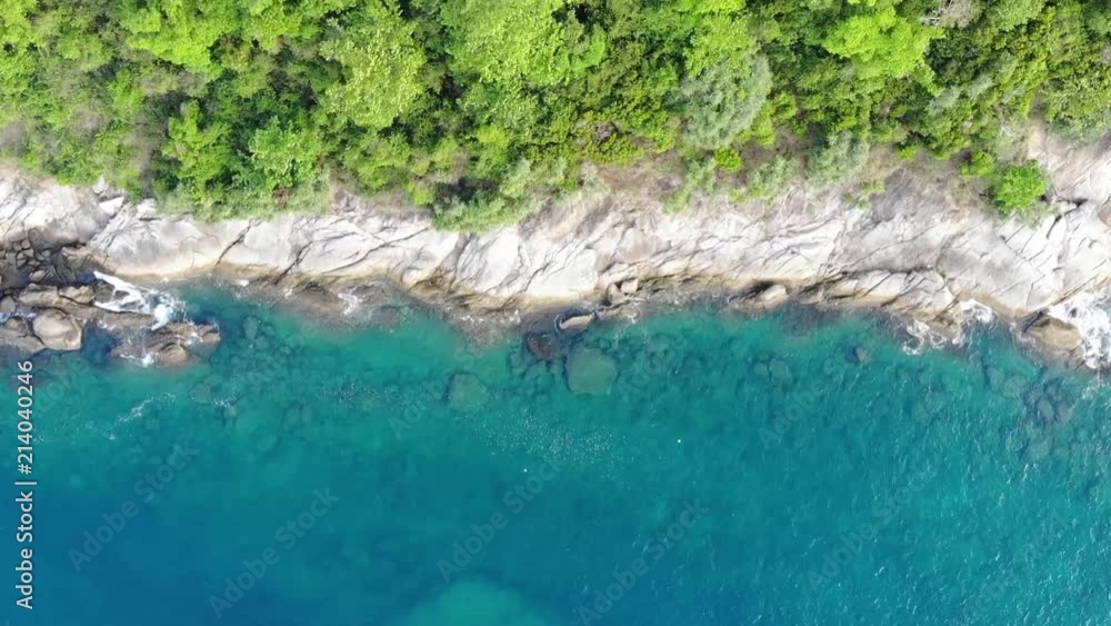Aerial drone shot from above, goes from clear water to pure vegetation and clear water again in a Thailand Island. Aerial drone shot from above, goes from clear water to pure vegetation and clear water again in a Thailand Island.