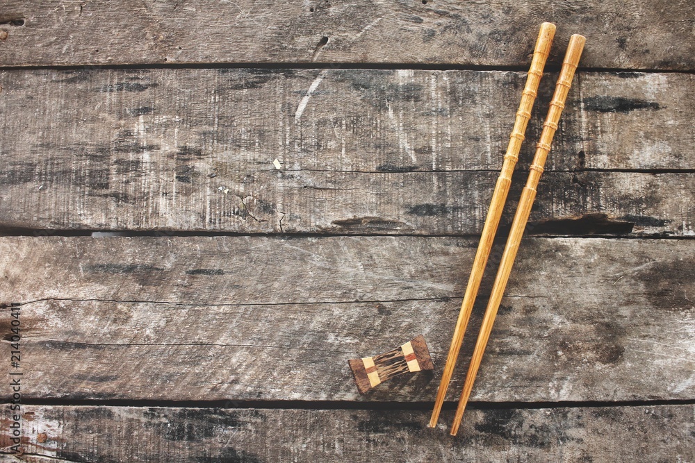 Chopsticks on wood background Chopsticks on wood background