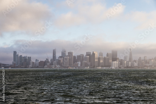 San Francisco downtown and financial district view from the Treasure island with late afternoon fog in California  USA