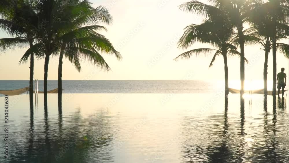Pool by the beach in the morning with floating unicorn Pool by the beach in the morning with floating unicorn