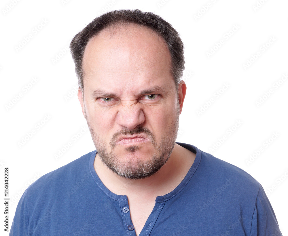 angry middle aged man with madman grimace angry middle aged man with madman grimace