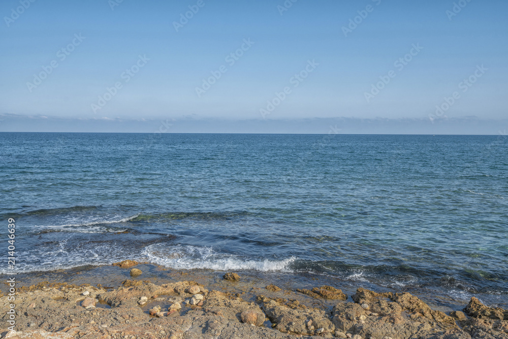 Coast of mediterranean sea with the sky and waves. Coast of mediterranean sea with the sky and waves.