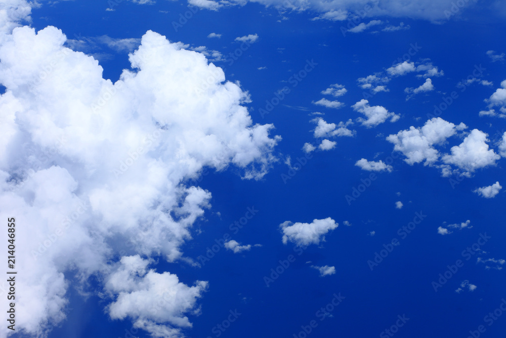 Obraz premium white fluffy clouds in the blue sky