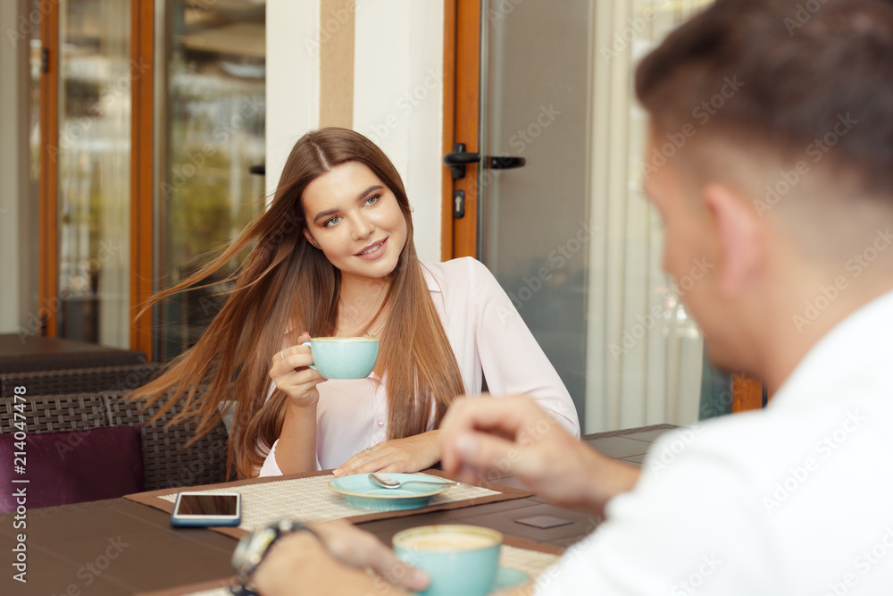 Fototapeta premium Two people in cafe enjoying the time spending with each other