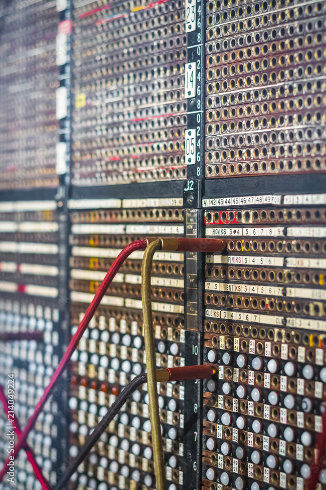 Selective focus, old fashioned manual telephone exchange switchboard