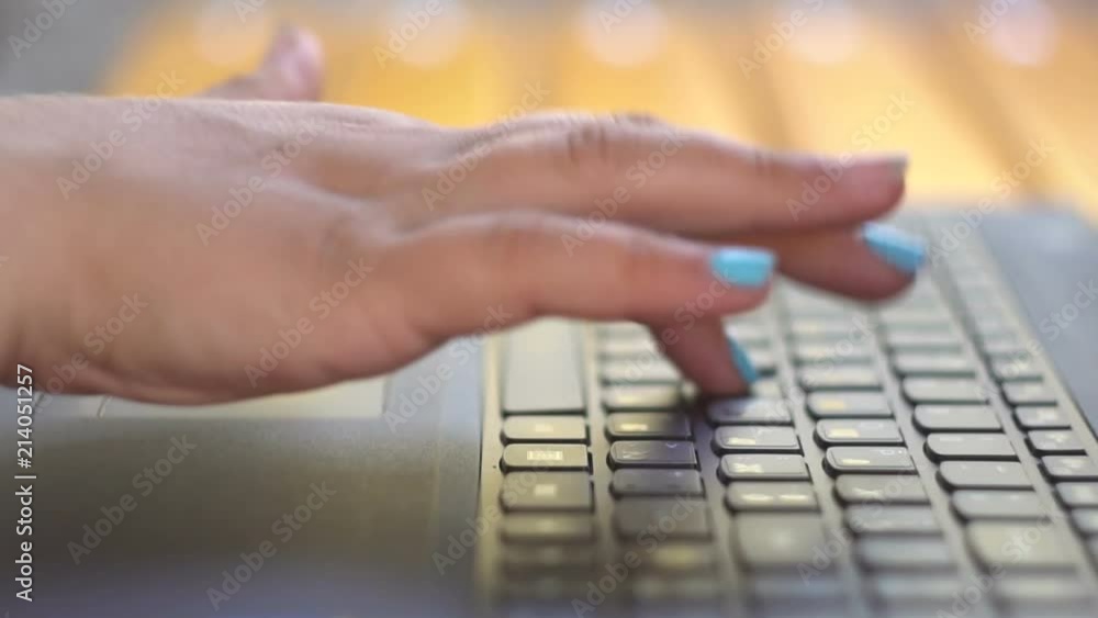 Female Fingers Using A Laptop Keyboard Female Fingers Using A Laptop Keyboard