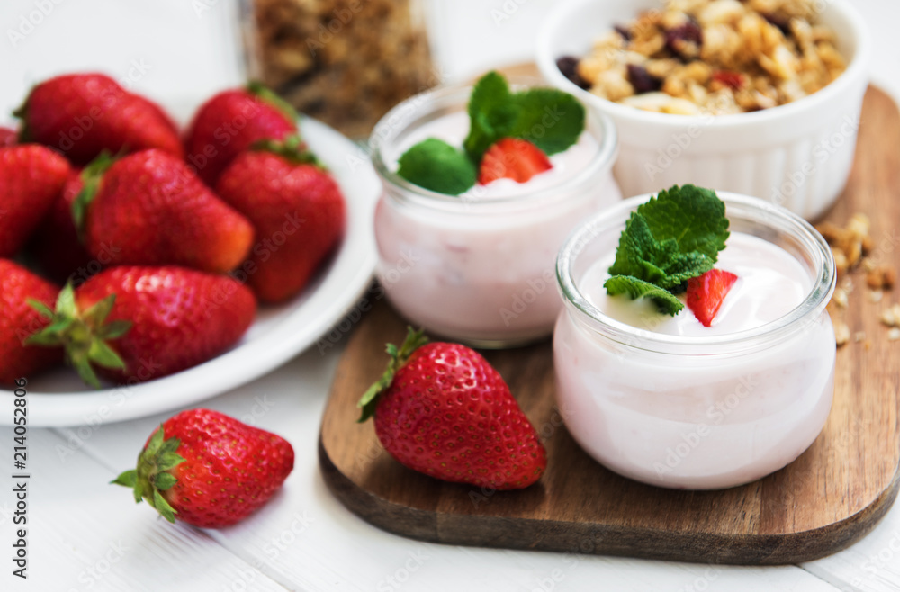 healthy breakfast, yogurt, fresh strawberries and granola healthy breakfast, yogurt, fresh strawberries and granola