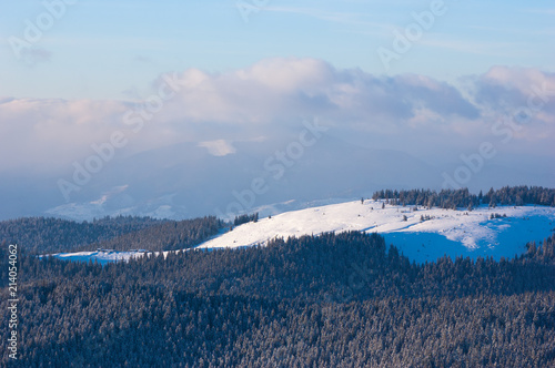 Winter landscape with a mountain valley