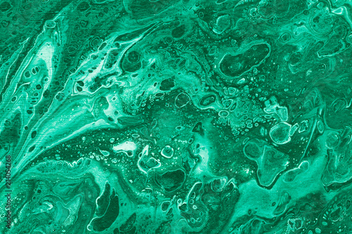 Malachite color marbling texture  Creative background with abstract oil painted handmade surface. Liquid paint. photo