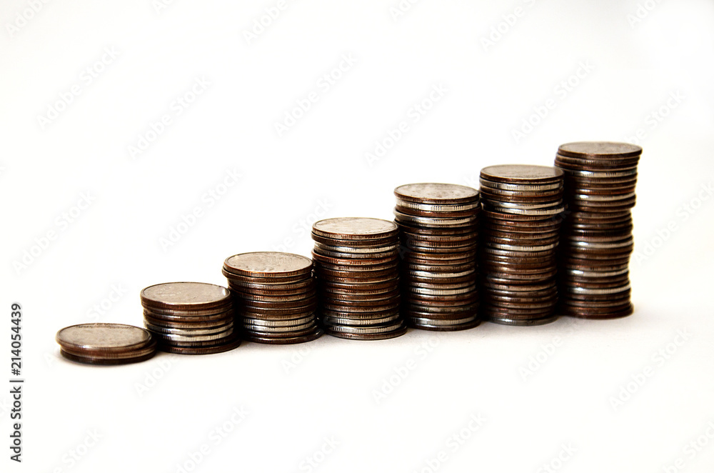 stacks of iron coins in ascending order, isolate on white background stacks of iron coins in ascending order, isolate on white background