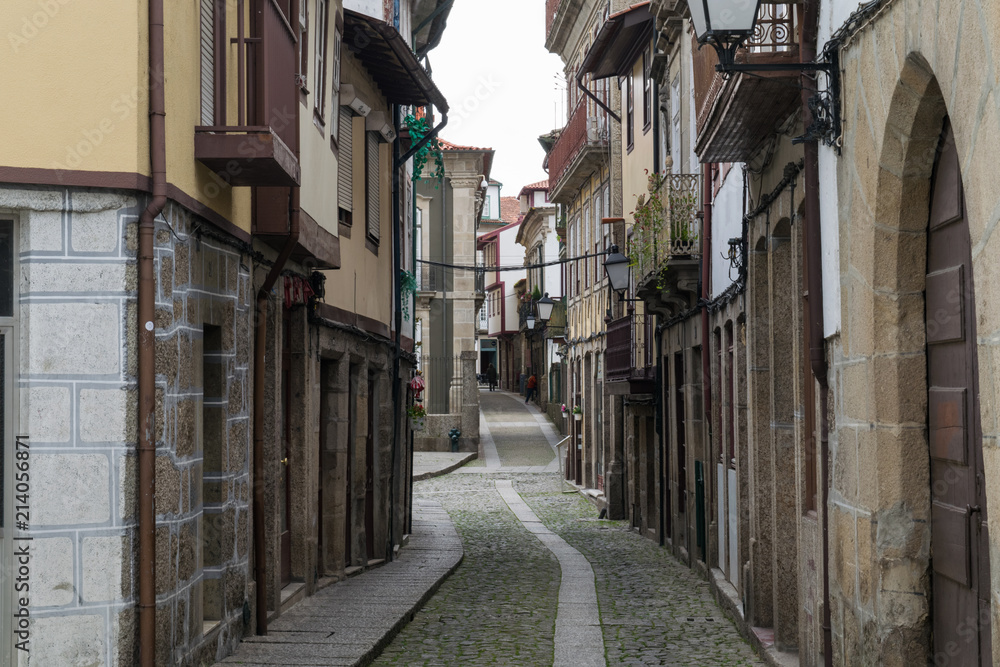 The historic streets of the Old Quarter in the city centre of Guimaraes, Portugal The historic streets of the Old Quarter in the city centre of Guimaraes, Portugal