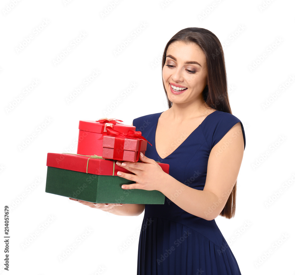 Beautiful young woman with gift boxes on white background Beautiful young woman with gift boxes on white background