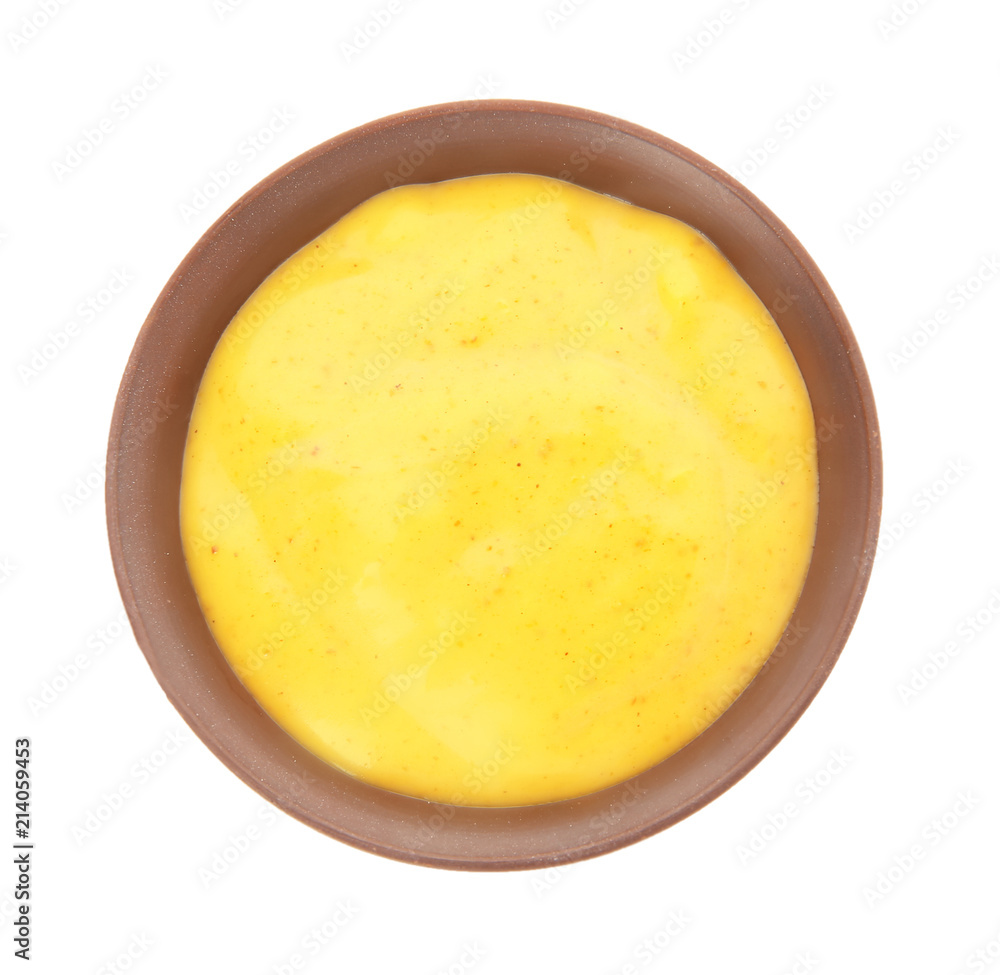 Bowl with curry sauce on white background, top view Bowl with curry sauce on white background, top view