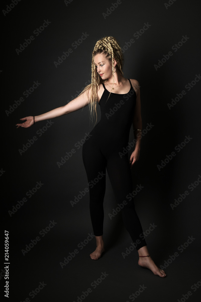 Blonde young woman dancing dancehall