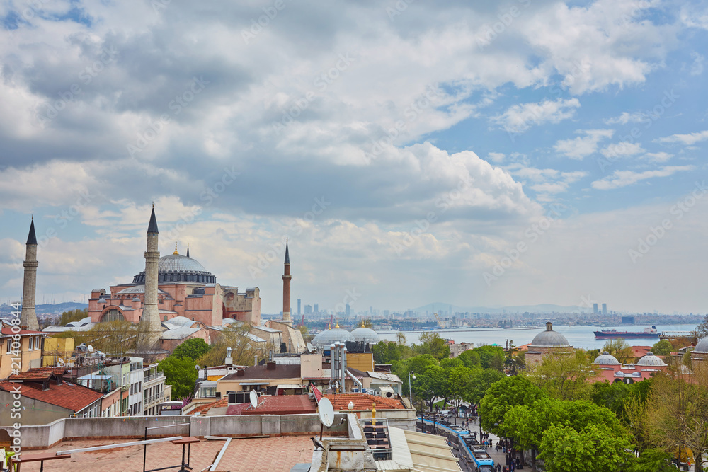 Hagia Sophia in Istanbul. Basilica of Hagia Sophia is one of the best-known sights in Turkey. Hagia Sophia or Aya Sofya on the blue sky background.