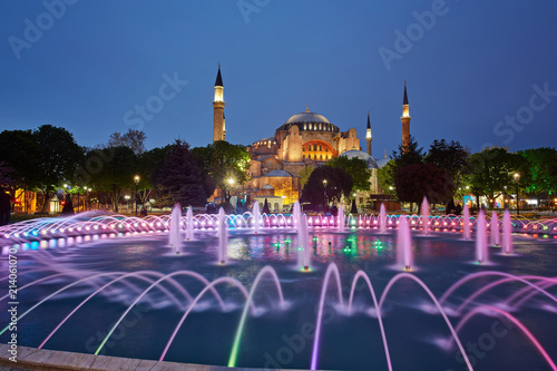 Photography Hagia Sophia basilica in Istanbul, Turkey, with colorful illuminated fountains