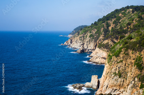 beautiful view of rocky cliff and blue sea in Spain