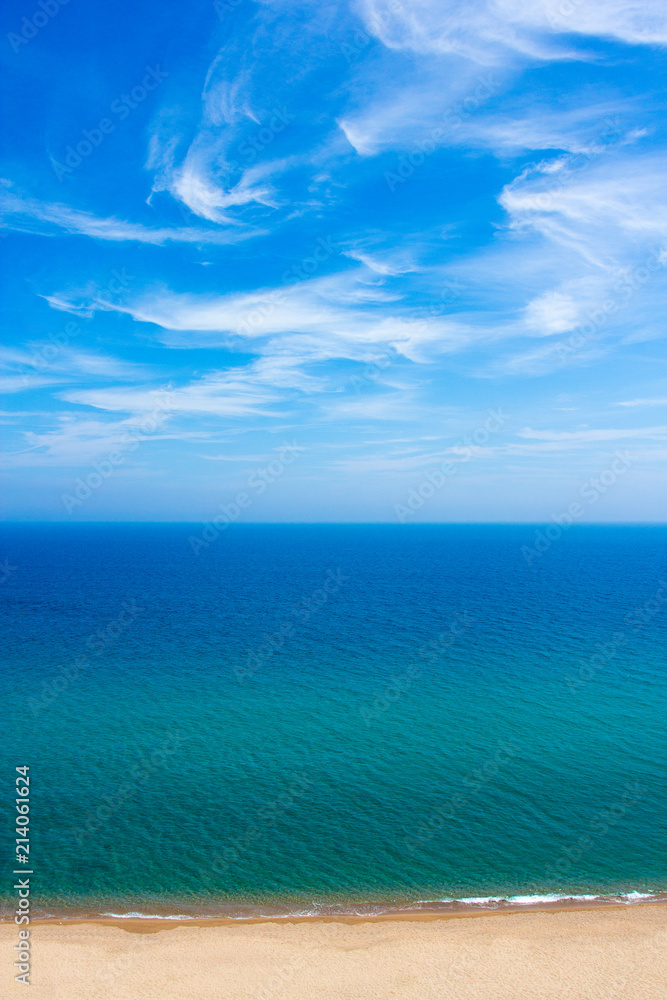 Fototapeta premium sandy beach and summer sea with sky and free space