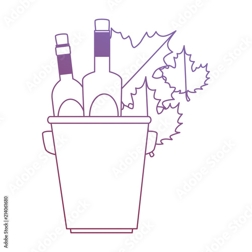 wine bottles in bucket with leafs