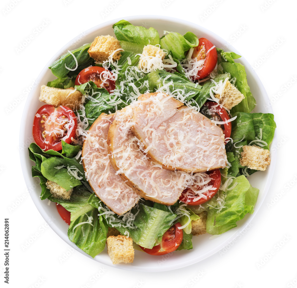 Caesar salad with chicken fillet and parmesan cheese isolated on white background. Caesar salad with chicken fillet and parmesan cheese isolated on white background.