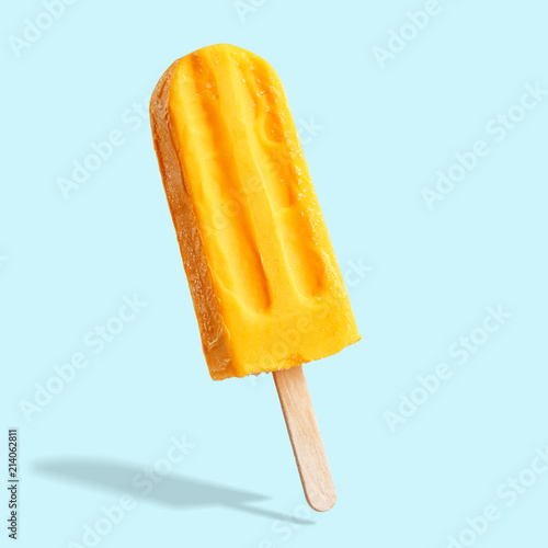 Fruit ice cream on a stick. Bright color, summer mood.