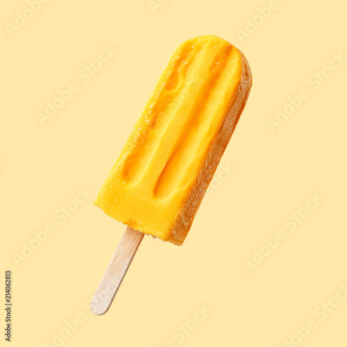 Fruit ice cream on a stick. Bright color, summer mood. photo