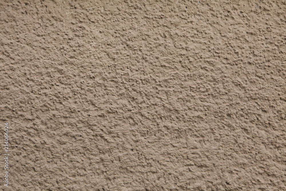 Dirty brown painted stucco wall. Background texture Dirty brown painted stucco wall. Background texture