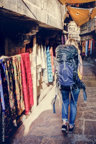 Western backpacker woman exploring India
