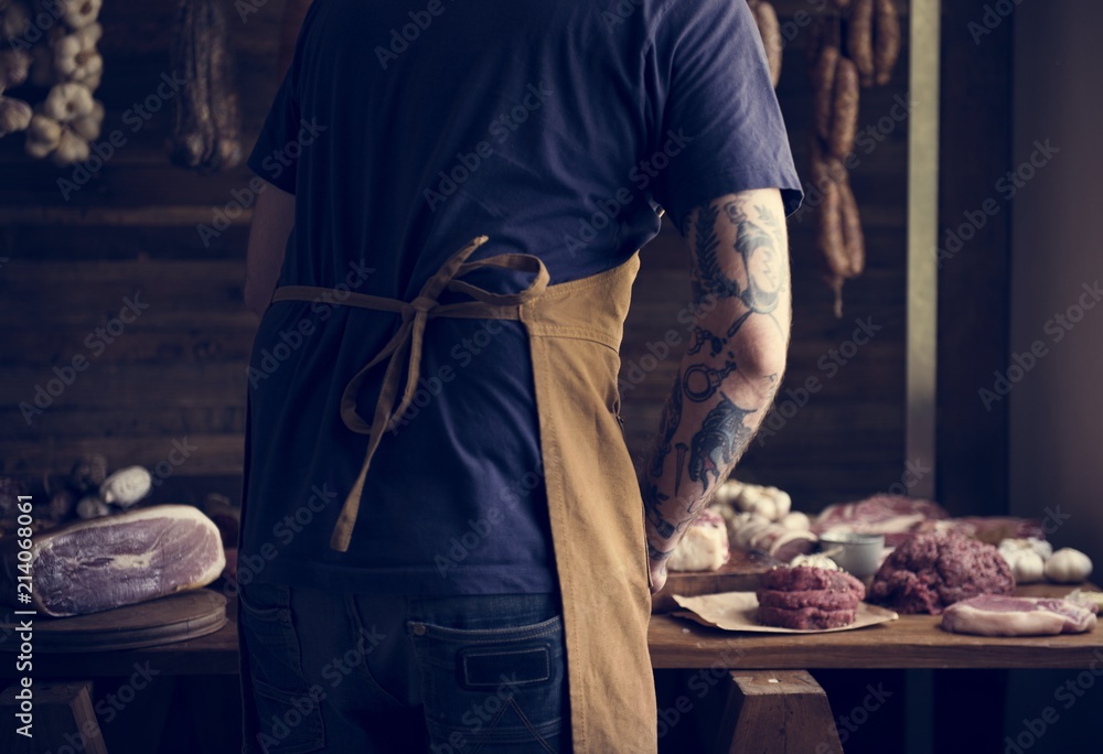 A chef preparing different ypes of meat food photography recipe idea A chef preparing different ypes of meat food photography recipe idea