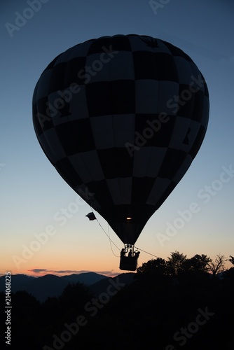 Hot air balloon against the evening sky at sunset