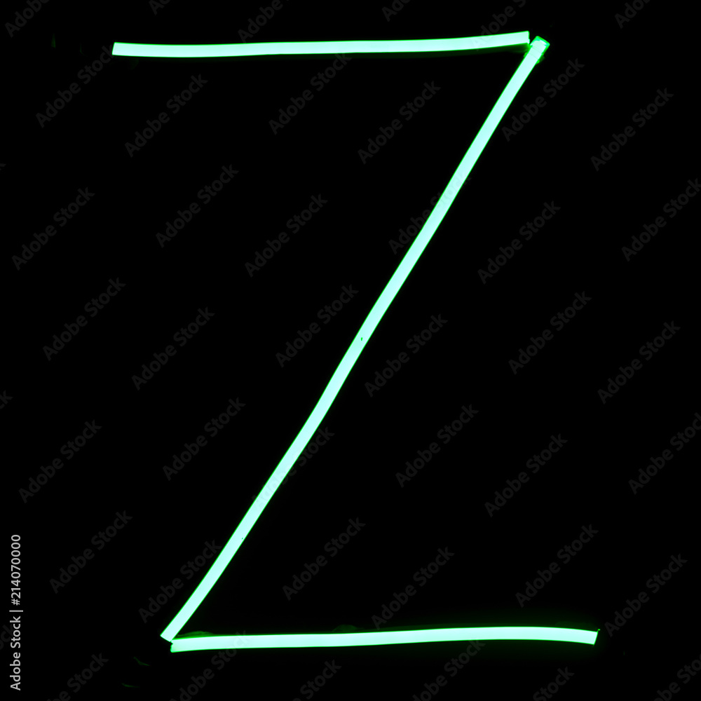 Green neon lights alphabet letters Green neon lights alphabet letters