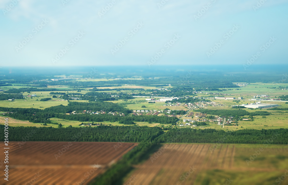 Private houses and meadows near Tallinn, Estonia. Aerial view.