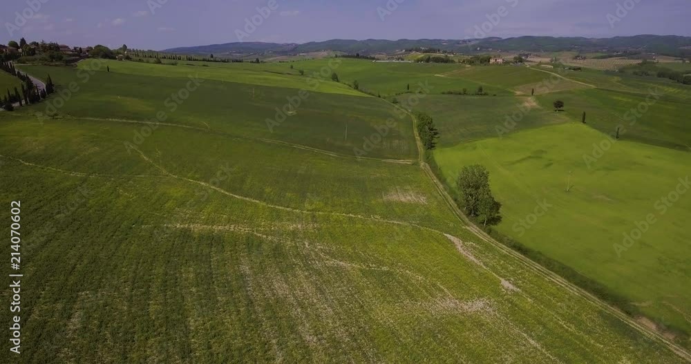 Aerial, beautiful green hills and fields landscape in Tuscany, Italy Aerial, beautiful green hills and fields landscape in Tuscany, Italy