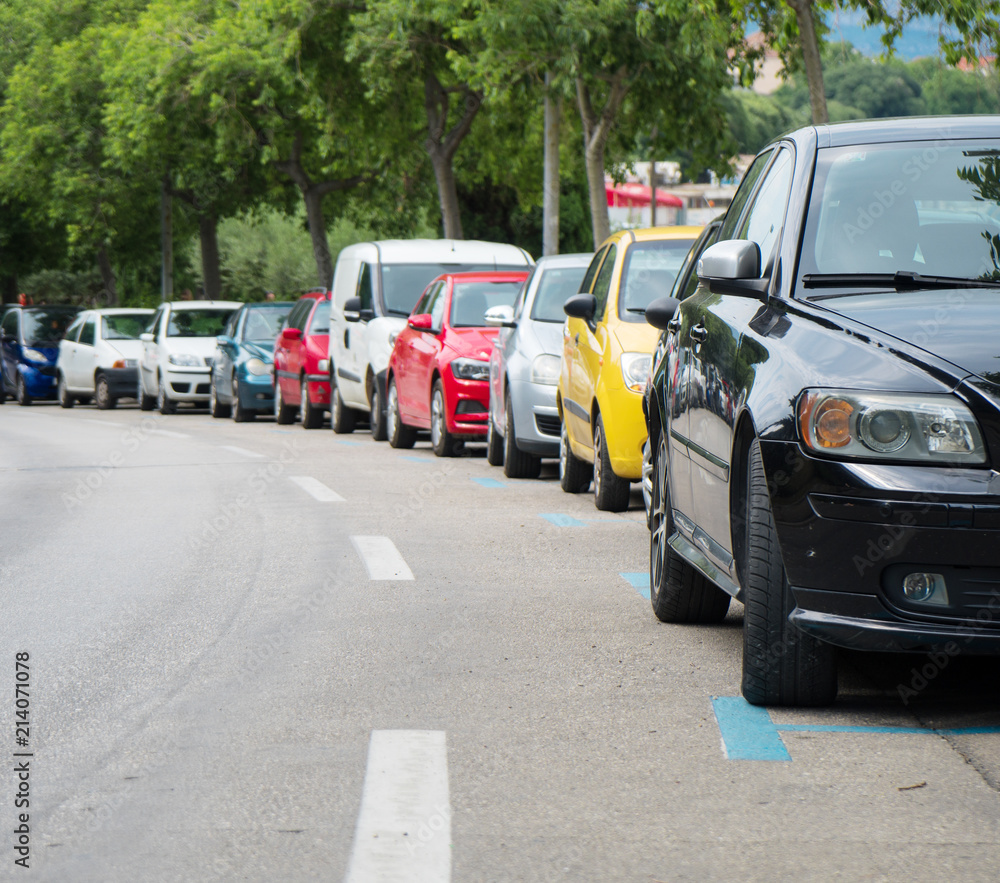 Cars parked along the street.