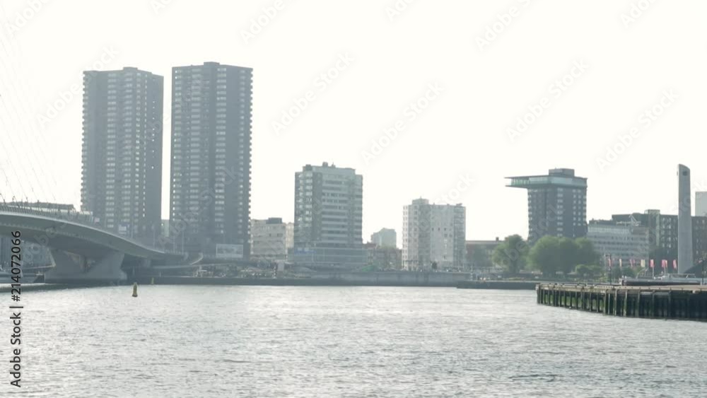 View of the Rotterdam skyline. Still shot overlooking the Maas river. View of the Rotterdam skyline. Still shot overlooking the Maas river.