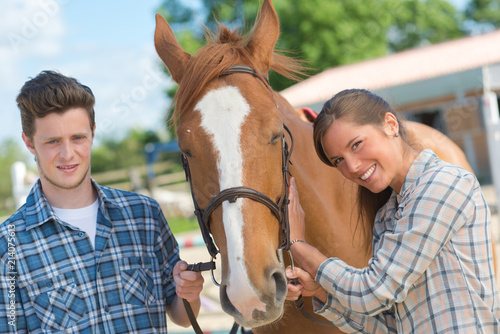 horse enthusiasts posing