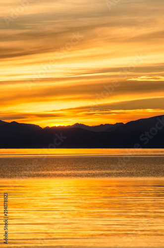 Beautiful sunset above the sea and mountain