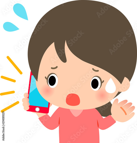 困った様子で携帯電話で話す若い女性