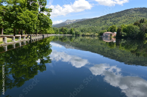 Lake Called The Sea With A House On The Other Side Of The Shore And The Clouds Reflected In The Water In The Gardens Of The Farm. Art History Biology. June 19, 2018. La Granja Segovia Spain.