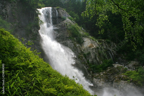 Waterfall Cascata di Lares in Parco Naturale Adamello Brenta near Pinzolo in South Tyrol in Italy 