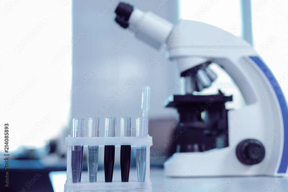 Samples for analysis. Test tubes with different liquids standing in the rack while being ready for biological analysis Samples for analysis. Test tubes with different liquids standing in the rack while being ready for biological analysis