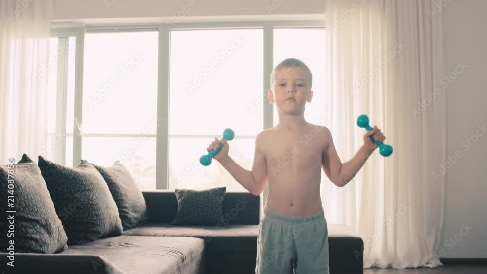 happy child doing sports at home happy child doing sports at home