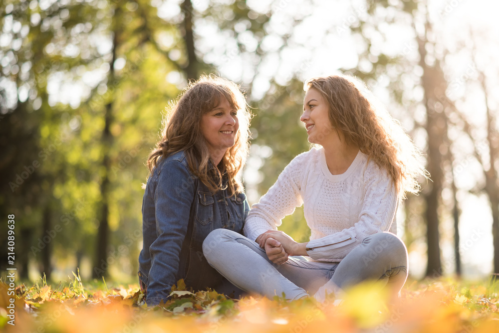 Mother and teenage daughter outdoor portrait Mother and teenage daughter outdoor portrait