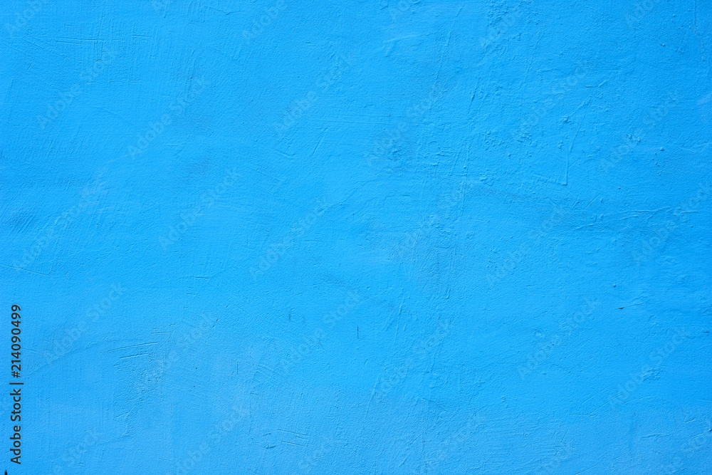 Background of a blue painted cement wall, rough cast of cement and concrete wall texture, decorative rustic coating