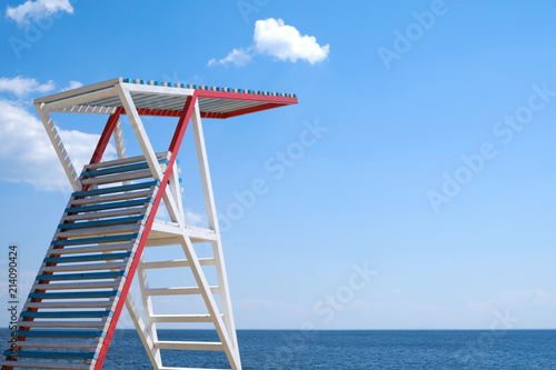 Lifeguard tower on the empty beach.