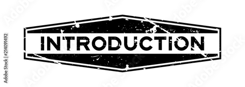 Grunge black introduction word hexagon rubber seal stamp on white background