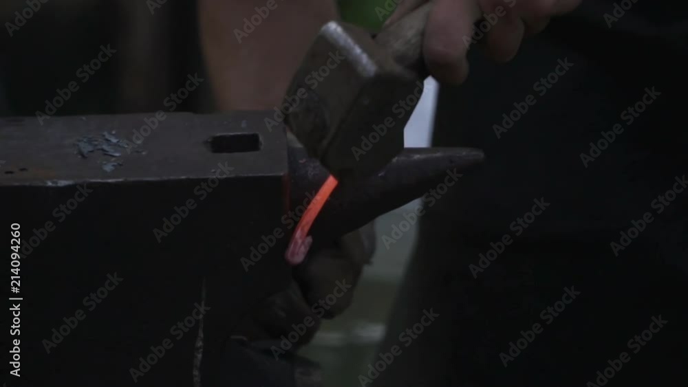 Blacksmith Forging a fire for heating metal, slow motion Blacksmith Forging a fire for heating metal, slow motion